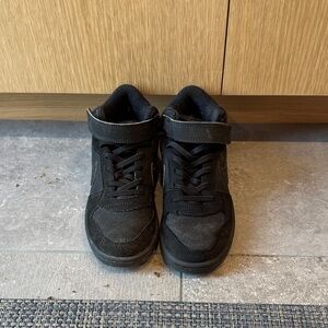 Black kid’s Nike Sneakers